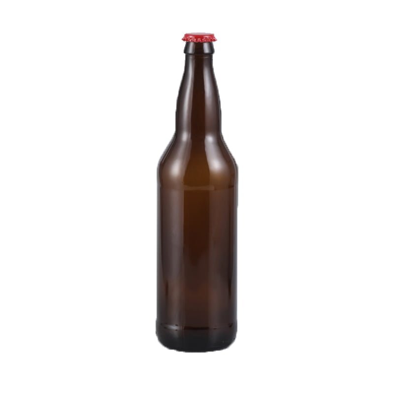 Leere Braunglas-Bomberflasche mit Kronkorkenmündung und rotem Verschluss