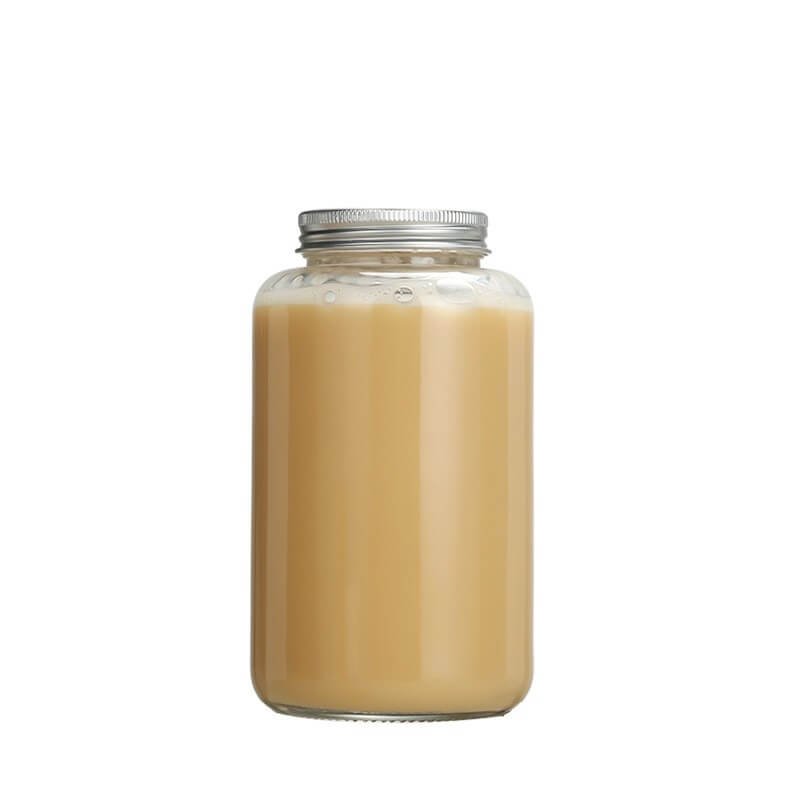Weithals-Saftglas mit Metallverschluss, gefüllt mit einem hellen Smoothie