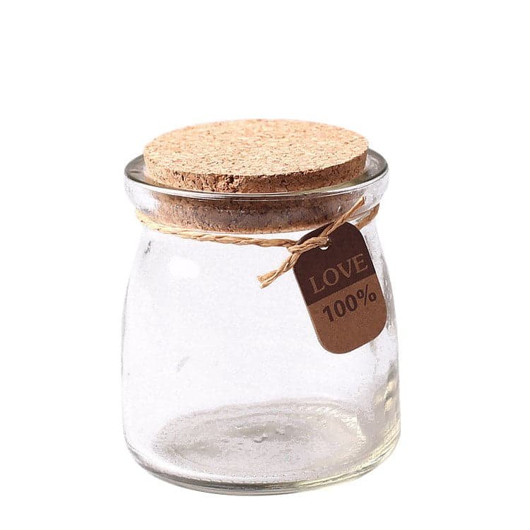 Tarrito de vidrio para postre con tapa de corcho y etiqueta colgante de papel