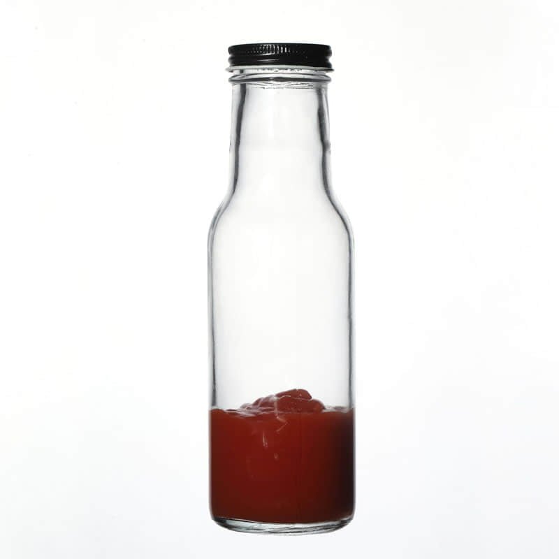 Klare Saucenflasche mit Twist-off-Mündung, rote Sauce im Boden abgesetzt