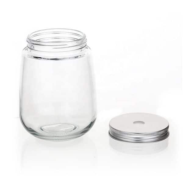 fat round glass milk bottle with cap